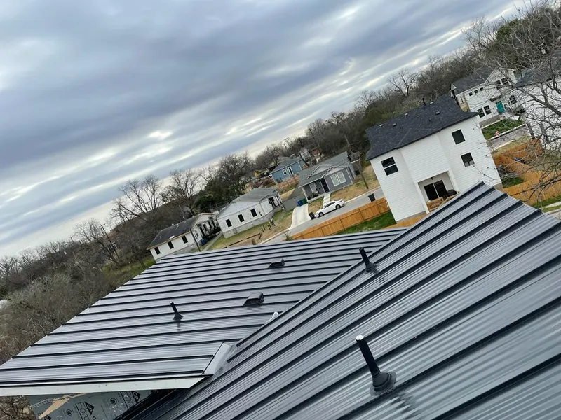 Standing seam metal roof panels with vents for Skylight Repair in Kaufman